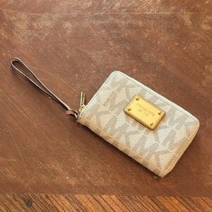 Michael Kors Light Tan Wristlet with Gold Accents